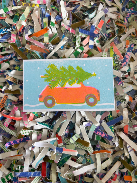 Red car with Christmas tree